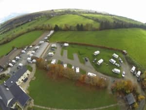 Caravns at the shepherds rest pub and caravan park from the sky - NI